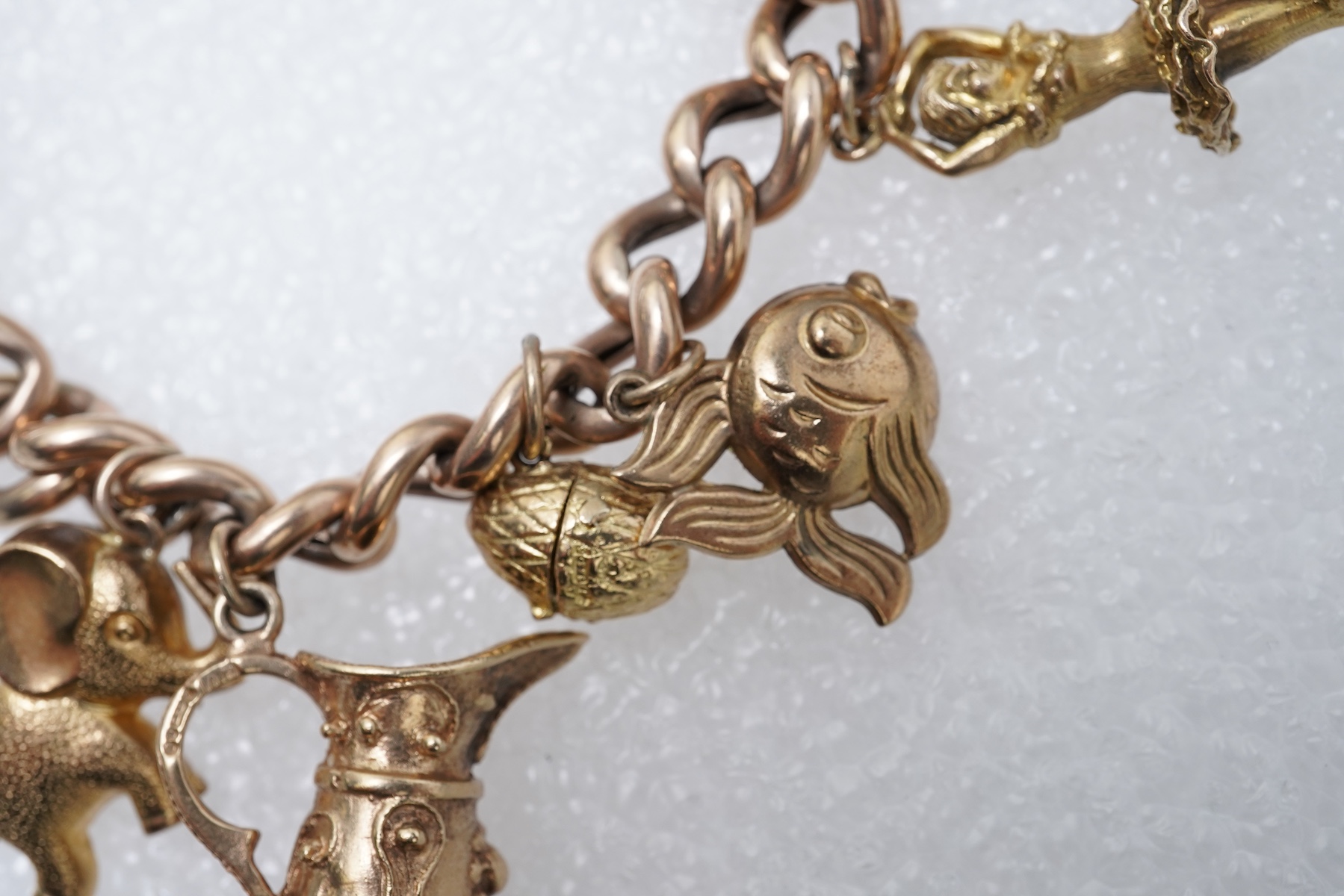 A 9ct gold charm bracelet